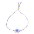 Bracelet œil porte-bonheur ajustable avec perle dorée