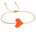 Bracelet néon orange avec cœur tressé