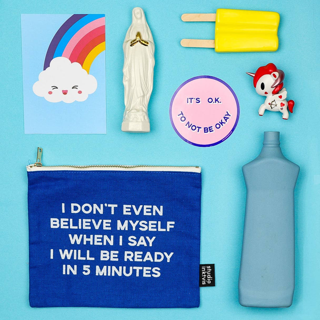 Trousse à maquillage bleue « I don't even believe »