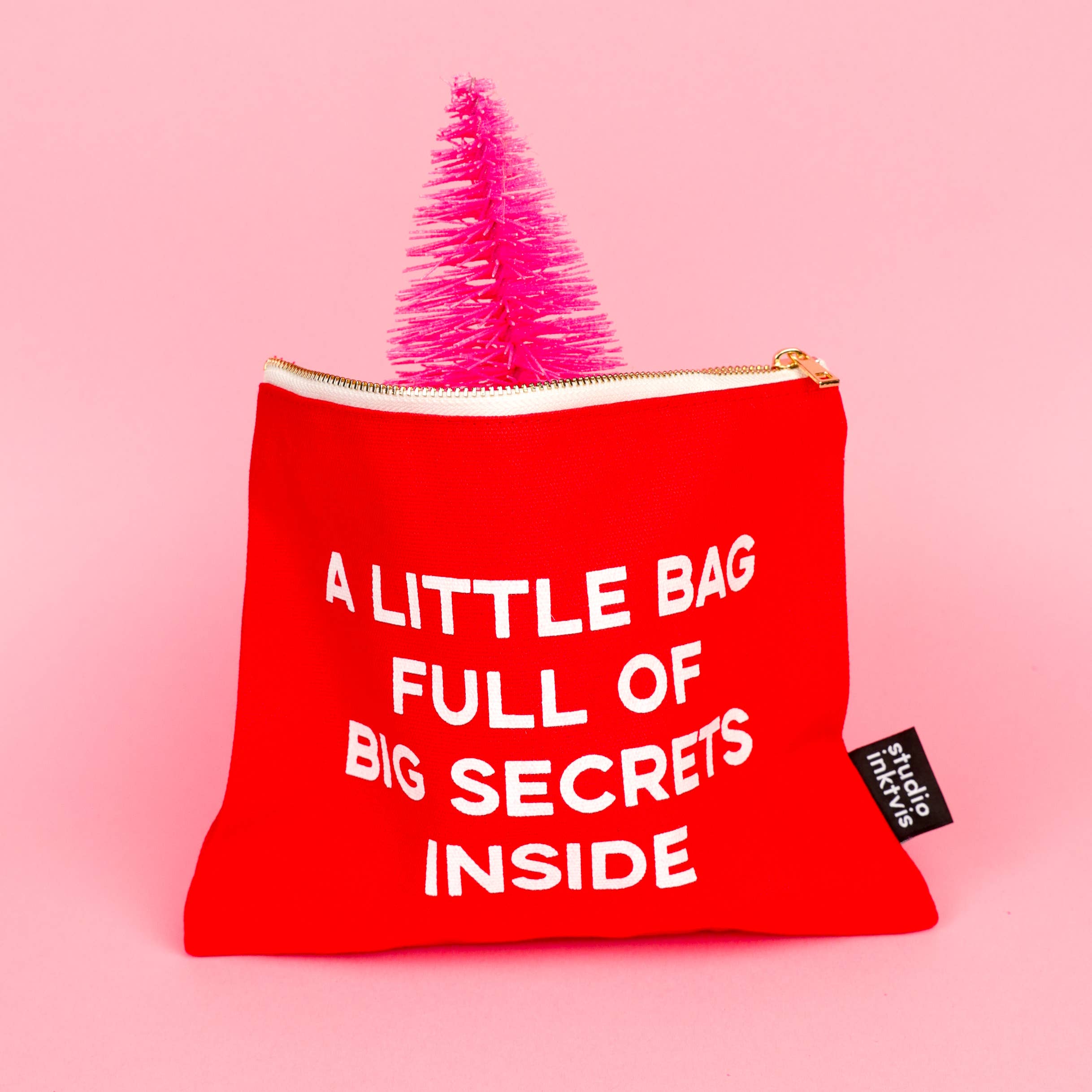 Trousse maquillage rouge « A LITTLE BAG FULL OF BIG SECRETS »