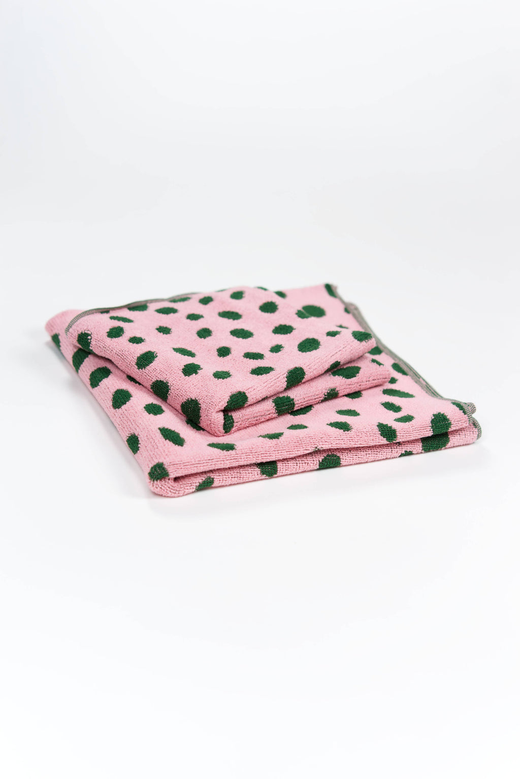 Serviette de plage à motifs galets rose et vert