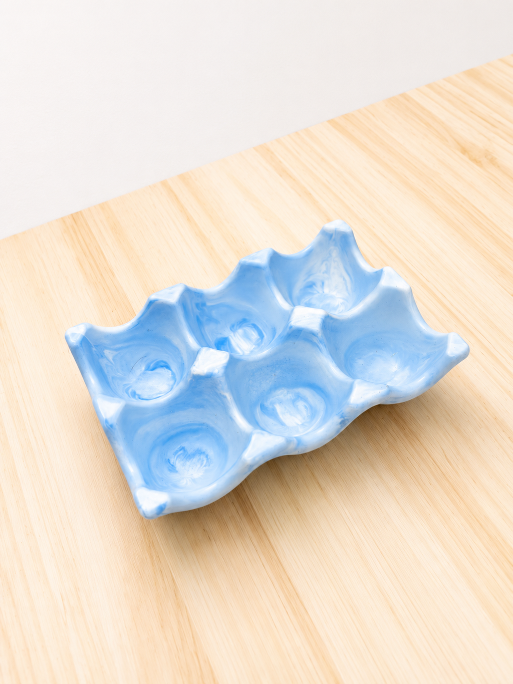 Support pour œufs bleu