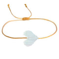 Bracelet fin corde dorée avec cœur tressé blanc