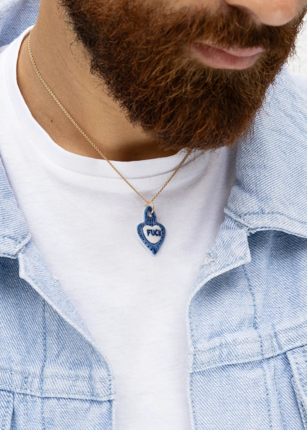 Collier en porcelaine Coeur bleu Fuck