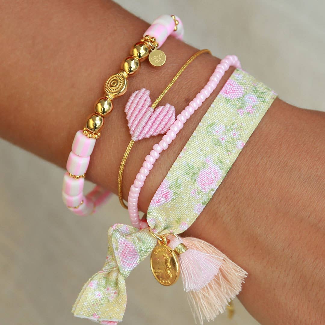 Bracelet fin avec cœur tressé rose pâle