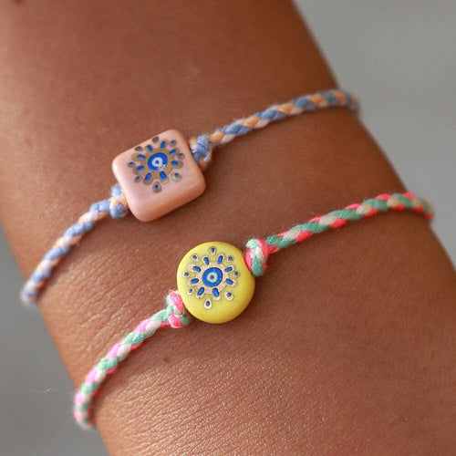 Bracelet œil porte-bonheur ajustable avec perle dorée
